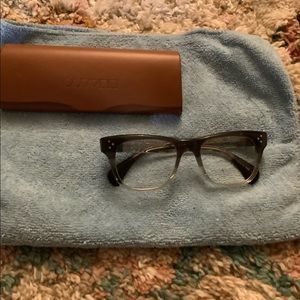 Oliver People’s prescription glasses
